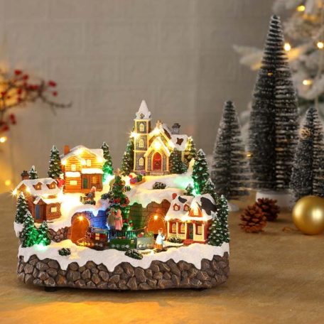 Mobil Digital XL karácsonyi falu 27 x 21 x 23 cm világító, zenélő karácsonyi jelenet 28 színes LED-el, 4 házikóval, karácsonyfával, mozgó vonattal, 8 dallammal