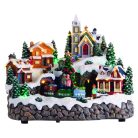 Mobil Digital XL karácsonyi falu 27 x 21 x 23 cm világító, zenélő karácsonyi jelenet 28 színes LED-el, 4 házikóval, karácsonyfával, mozgó vonattal, 8 dallammal